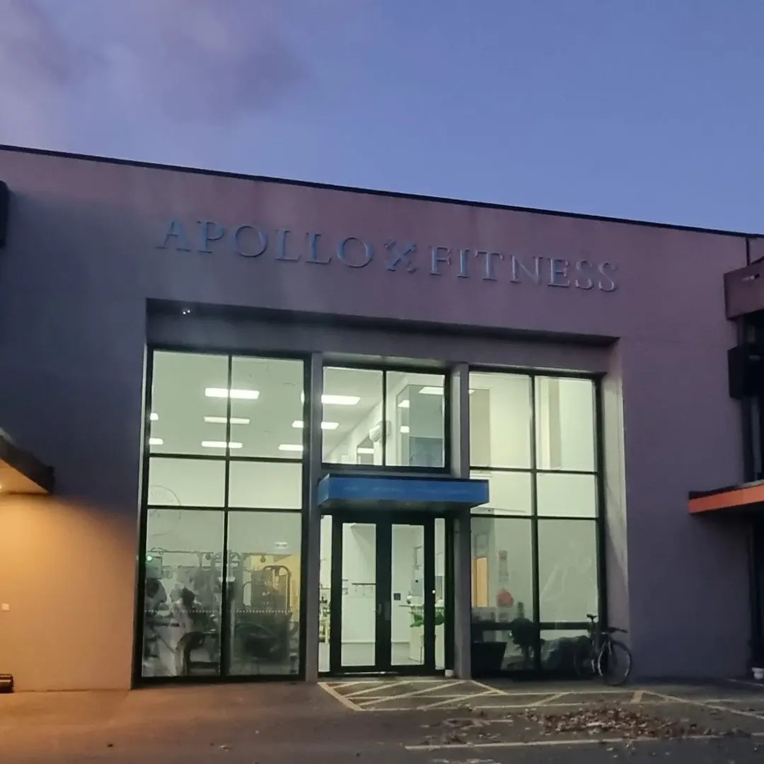 The entrance to Apollo Fitness at dusk