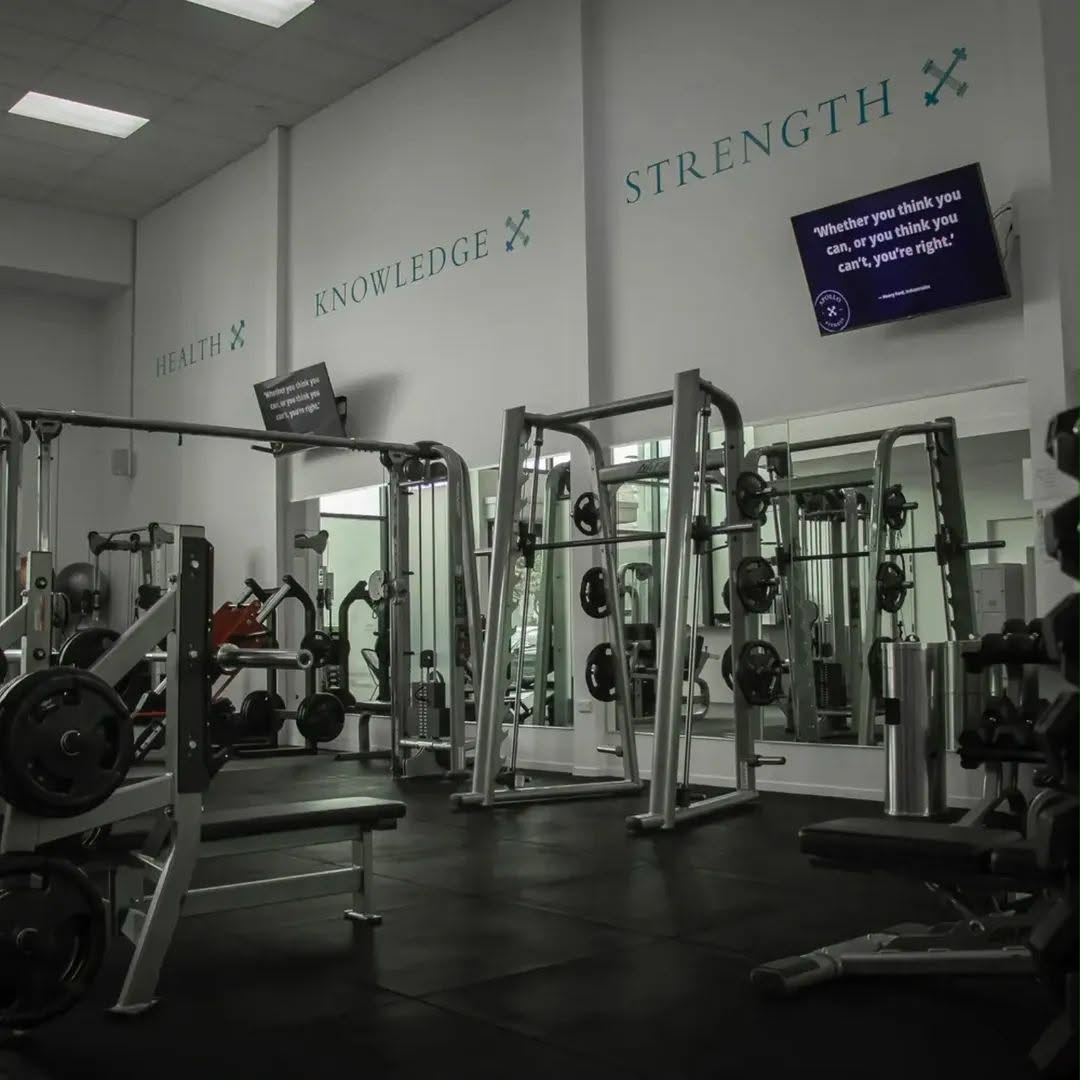 The strength training equipment and open space at Apollo Fitness