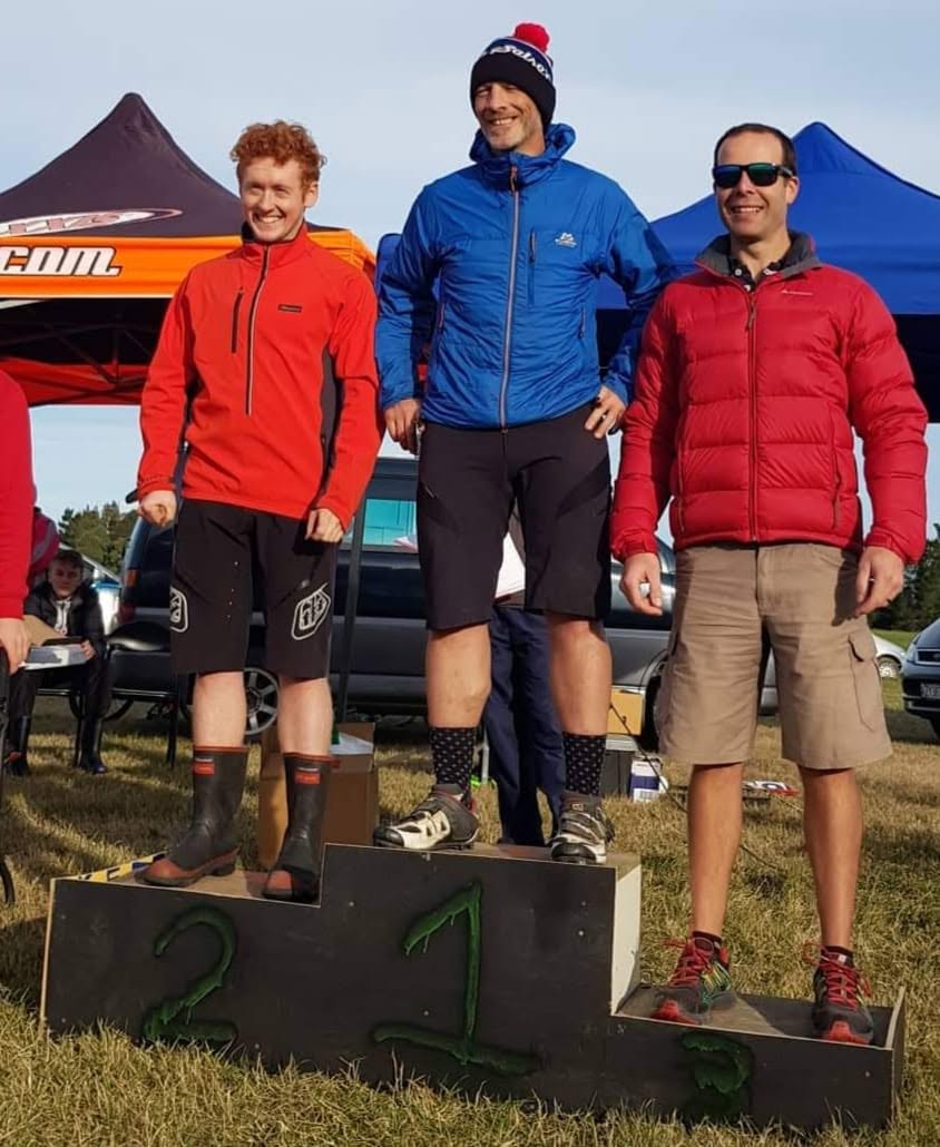 Ken’s supplied podium photo with fellow competitors